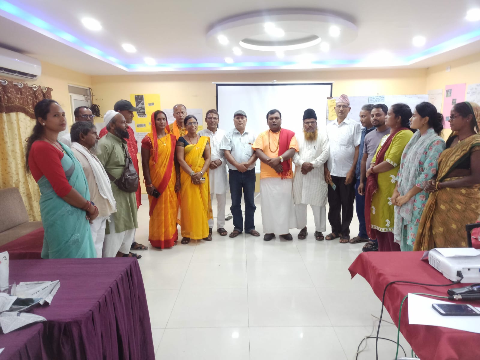 Participants and facilitators posing for a group photo after the workshop