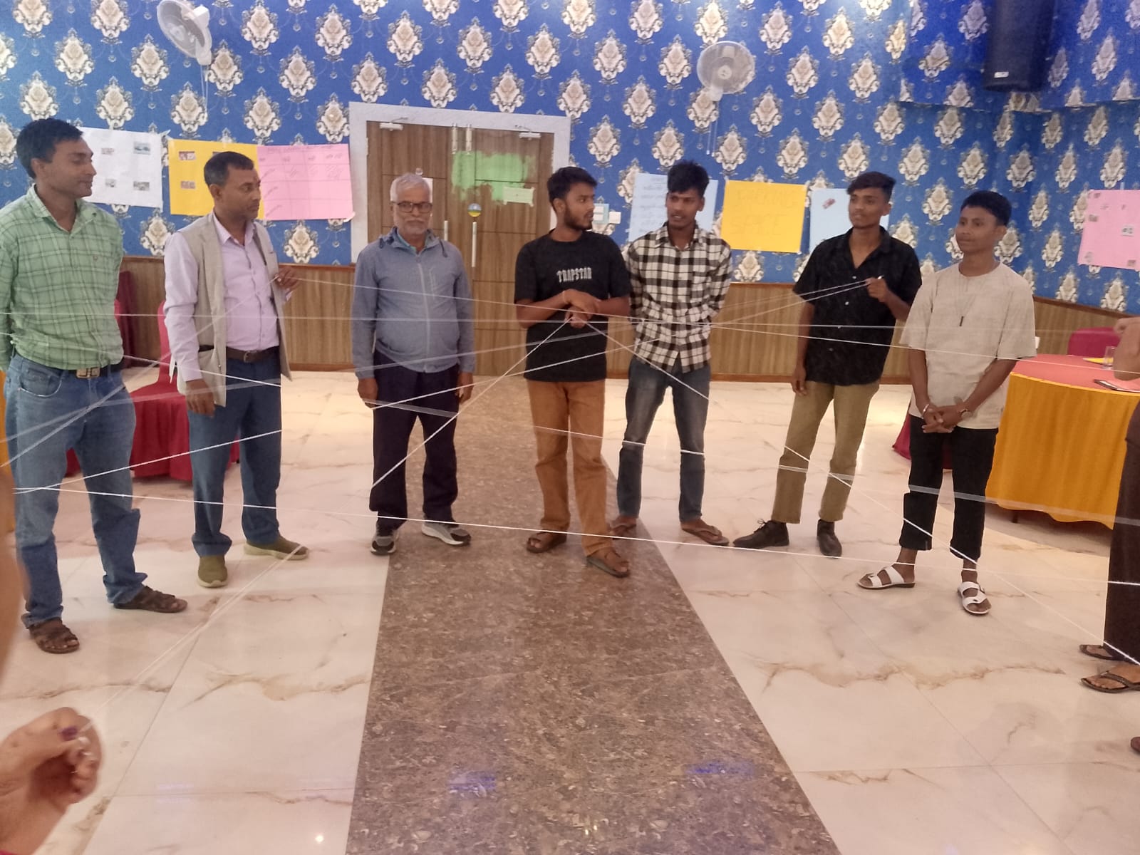 Participants playing a rope game during the workshop